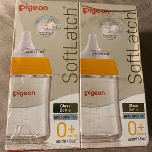 Glass Baby Bottle with Orange Cap